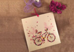 Invitatii nunta model fluturi si bicicleta romantice